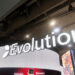 Evolutionin logo ICE-rahapelitapahtumassa.